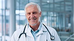 Face, happy man and mature doctor in hospital for healthcare, cardiology or wellness service. Smile, physician and medical professional, confident surgeon or medicine expert with experience in clinic