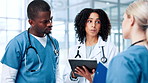 Surgeon, discussion or doctors in clinic with tablet, planning or health treatment results in group. Check, teamwork or people in meeting for medical advice, hospital schedule or diagnosis research