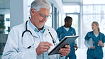 Doctor, tablet and telehealth with man in hospital for review of information or records. Medical, smile and stethoscope and with mature medicine professional in clinic for cardiology results