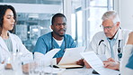 Paperwork, talking or doctors in meeting with teamwork, planning and treatment results in hospital. Healthcare, medicine report and people with documents for medical info, clinic schedule or research