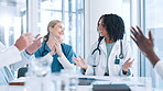 Success, nurses and doctors with applause for surprise in meeting to celebrate healthcare. Medical team, people and clapping hands for hospital report, results and announcement of achievement