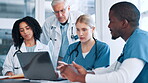 Doctors, medical staff and laptop with team in meeting for discussion in healthcare. Nurses, people and technology for hospital report, results and research with collaboration for planning procedure