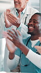 Applause, medical and success with people in hospital for clinical trial team, research grant approval and news. Nurse, healthcare announcement and winner with group of doctors in meeting for bonus