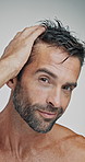 Man, hairstyle and cosmetics with face in studio for grooming, results or confident by background. Mature person, model and shirtless for pride, wellness or routine with change for hair care in Italy