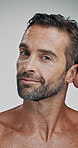 Man, hair care and hand with face in studio for grooming, results or confident by background. Mature person, model and shirtless for cosmetics, wellness or routine with change for hairstyle in Italy