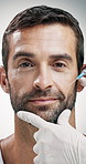 Syringe, beauty and face with man and hand for dermal filler, anti aging and smile lines treatment. Dermatology, cosmetic injection and collagen with mature person on white background for wrinkles