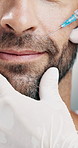 Injection, filler and mouth with man and hand for collagen, anti aging and facelift treatment. Dermatology, cosmetic procedure and beauty with closeup of person for wrinkles, needle and smile line