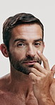 Beauty, face and brows with man in studio for dermatology, anti aging and self care. Skincare treatment, cosmetics and glow with mature person on white background for grooming, hygiene and facial