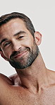 Studio, face and skincare for man, smooth and facial treatment for glow of skin, beauty or dermatology. White background, grooming and person with routine for self care, cosmetics or confident in USA