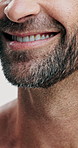 Mouth, beard and man with smile, skincare and funny with grooming, morning routine and cosmetics. Person, closeup and model with confidence, aesthetic and wellness with hair care, joy and dermatology