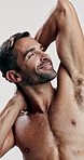 Studio, shirtless and skincare for man, relax and facial treatment for glow of skin and dermatology. White background, grooming and person with routine for self care, cosmetics and confident in USA