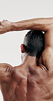 Fitness, stretching and back of man in studio for sports athlete, workout and flexing muscle. Body care, warm up and bodybuilder with person on white background for training, exercise and wellness