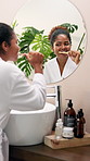 Happy, black woman and brushing teeth with mirror in bathroom for dental care or hygiene at home. Female person, bamboo or oral clean with reflection for fresh breath or morning routine at house