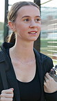 Sports, walking and fitness with woman at tennis court of competition match, training and athlete. Workout, exercise and challenge with person at turf club for game, wellness and tournament practice