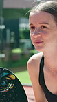 Padel ball, woman and racket on court for playing tournament, match practice and waiting for serve. Happy, tennis player and girl for challenge training, performance fitness and competition workout