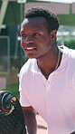 Padel ball, black man and racket on court for playing tournament, match practice and waiting for serve. Happy, tennis player and guy for challenge training, performance fitness or competition workout