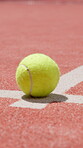 Tennis ball, sports and fitness with floor of court for competition arena, challenge match and training ground. Tournament, equipment and game with closeup in turf pitch in club for practice