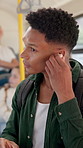 Student, man and travel with earphones on bus for music streaming, journey or radio for morning commute. Backpack, passenger and listening to audio playlist on public transport for ride to university