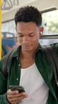 Man, student and earphones with phone on bus for listening to music, podcast and public transport. Passenger, mobile and streaming audio of morning commute, sound connection and journey to university