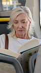 Woman, reading and book for bus travel for literature hobby, story information and public transport. Mature passenger, novel and ride entertainment for tourism, free time and guide of morning commute