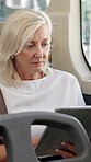 Mature woman, travel and tablet on bus for reading ebook, public transport and social media. Female passenger, digital and morning commute with research, metro service schedule and story information