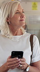 Phone, thinking and travel with happy woman on bus for public transportation to city destination. Idea, social media and text message with mature passenger in vehicle for commute, journey or trip
