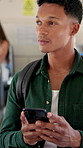 Phone, student and travel with man on bus for public transportation to college destination. App, social media and thinking with happy passenger person in vehicle for commute or trip to university