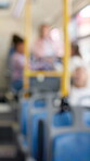 Blur, bus and people travel on journey for morning commute, trip and parent playing with child. Public transport, passenger and service for tourism, vacation and group ride to location for holiday