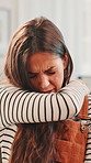 Sick, woman and cough with illness on sofa for chest pain, asthma or respiratory infection at home. Female person, cold or flu with symptoms of virus for pneumonia, bronchitis or allergies at house
