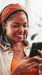 Online dating, phone or black woman in home with smile on social media, texting application or chat subscription. Happy, gen z or girl with mobile message or meme for post, flirting or romantic match