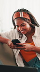 Texting, phone or black woman in home laughing of social media, dating application or chat subscription. Funny joke, relax or girl with mobile message or smile for post, flirting or romantic match