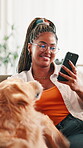 Happy, dog and woman with smartphone, home or love for emotional support animal, pet care or lounge. House, owner and black person with golden retriever in living room, smile or adoption of companion