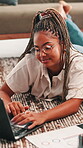 Research, smile and woman with laptop, home and studying for assignment in lounge and online course. House, student and black person with tech for elearning, typing and girl with glasses on floor