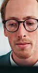 Glasses, business man and face with reading for research, information and corporate attorney with case file on laptop. Review, analysis and vision for private equity with legal insight at law firm