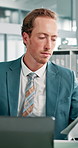 Paperwork, laptop and business man in office for financial review, budget report and planning. Professional, corporate and finance consultant on computer for research, website and investment project