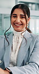 Office, business and face of Indian woman on laptop for financial review, budget report and planning. Professional, corporate and portrait of person on computer for research, website and investment