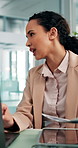 Business, conversation and woman with laptop, documents and planning with financial report. Employee, economy and accountant in modern office, paperwork and pc with revenue review or funding proposal