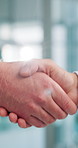Shaking hands, deal and business people in office with meeting, greeting or welcome. Deal, introduction and financial consultant with client for investment, contract or agreement handshake together.