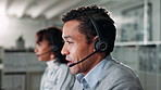 Call center, man and customer support in office with crm, communication and online consultant. Contact us, headset and technical service help, telemarketing or sales agent coworking for hotline