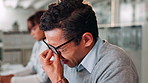 Frustrated, businessman and headache with glasses or eye strain for pressure, burnout or overworked at office. Tired, man or employee with migraine, anxiety or vertigo for deadline tasks at workplace