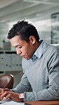 Documents, typing and businessman in office with report for finance dividend, profit or revenue. Technology, paperwork and male financial manager with email for client communication in workplace.