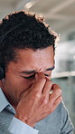 Frustrated man, consultant and headache with headset for stress, burnout or difficult customer at call center. Tired, male person or agent with migraine for online consultation, error or eye strain