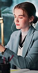 Communication, information and reading with business woman at desk in office at night. App, social media and text message with corporate employee in workplace for evening agenda, deadline or update