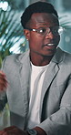 Black man, discussion and meeting at night in office, share ideas or information for digital marketing collaboration. Project management, SEO deadline and team speaker, conversation or explanation