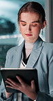Tablet, night and business woman in office for compliance email, review or deadline. Digital technology, serious and worker with app for communication, update policy or project for regulations online