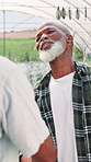 Senior man, family or handshake on farm for greeting, welcome or support. Black people, elderly father or hug son in greenhouse for care, reunion or appreciation for help with agriculture development