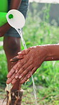 Water, washing hands and farming with people in nature for sustainability, agriculture and cleaning. Environment, carbon capture and splash with closeup of farmers in countryside for growth and field