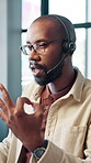 Black man, call center and headset with discussion, mic and consulting for advice at office. Person, agent and customer support at help desk, contact us and explain with voip connection at workplace