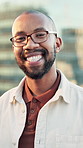 Face, creative and happy businessman in city for ambition with journalist laughing. Portrait, smile and African employee outdoor, professional reporter and news editor travel with glasses in Tanzania