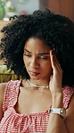 Stress, thinking and woman with headache, home and worried about rent, unemployment or living room. Pressure, reflection and person with migraine in lounge, contemplating or anxious for debt in house
